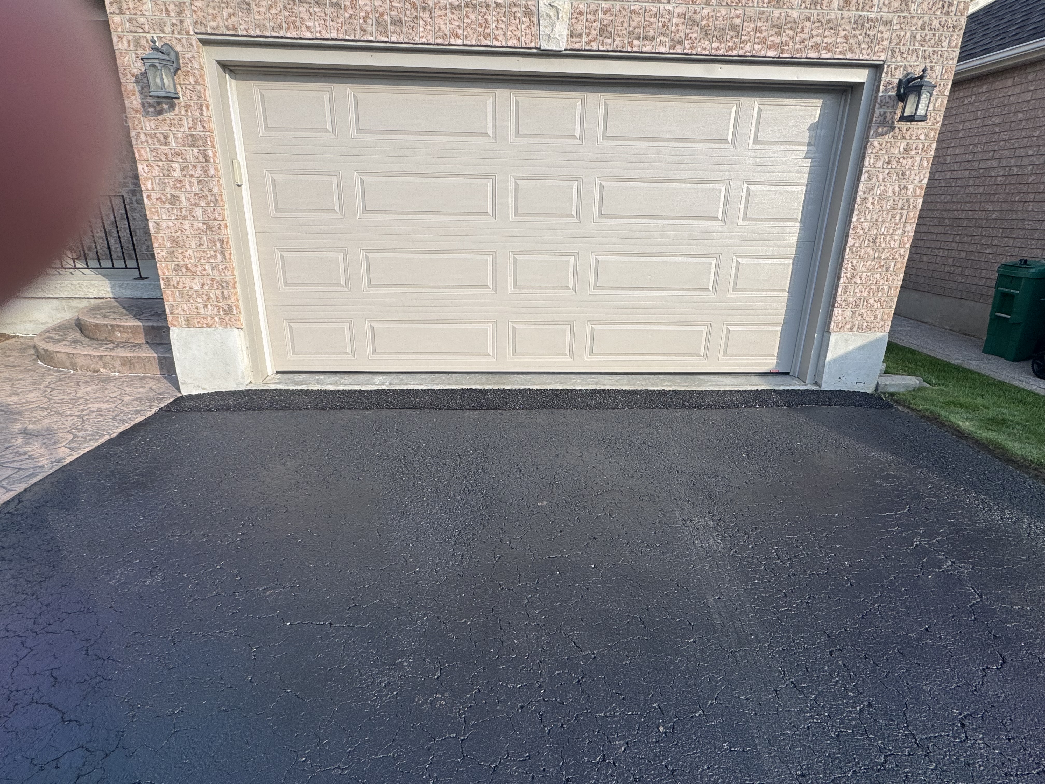 Cold patch asphalt garage ramp (driveway apron) installation in Waterloo Ontario