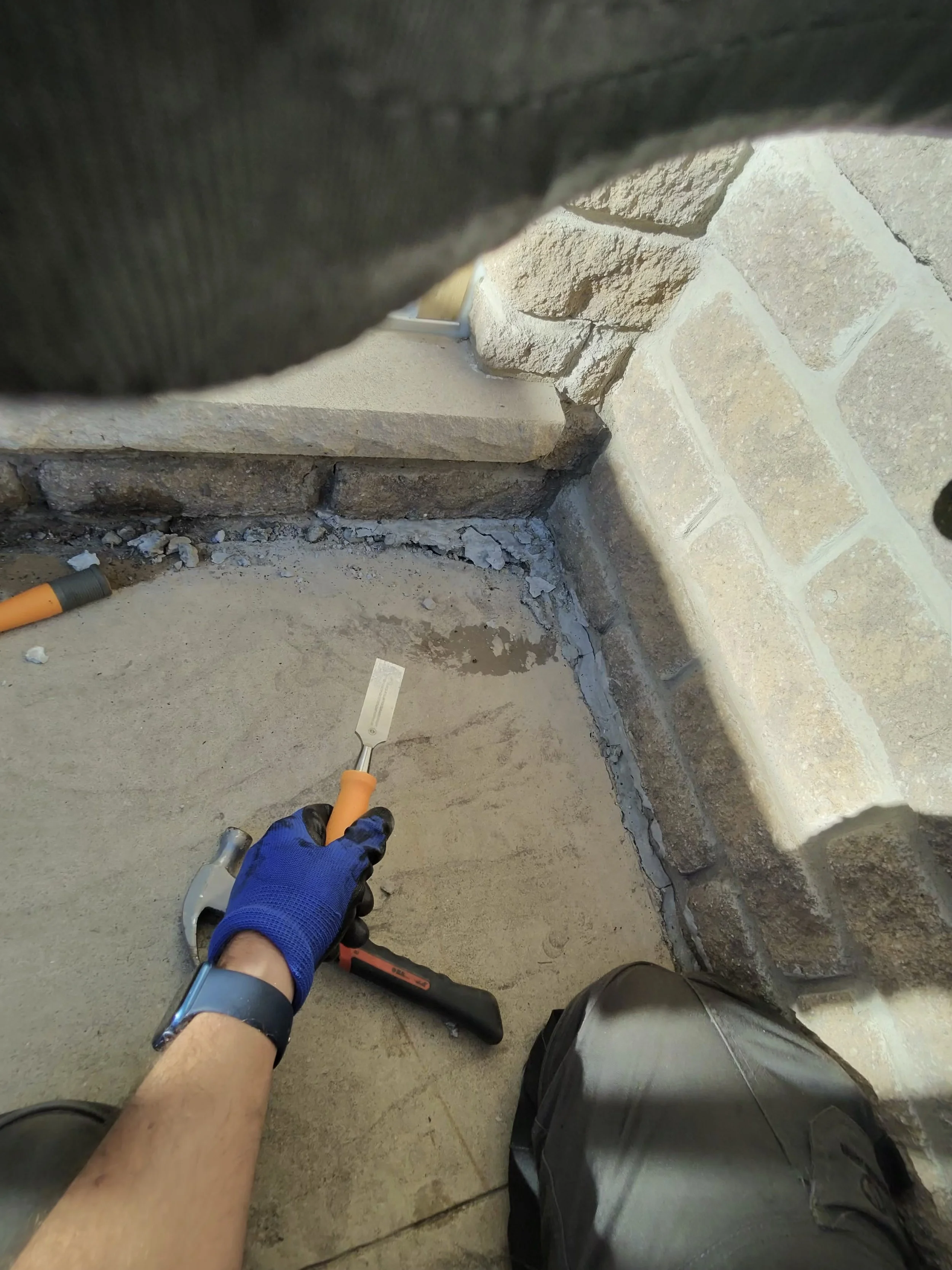 Applying joint sealant during concrete sealing prep, Guelph
