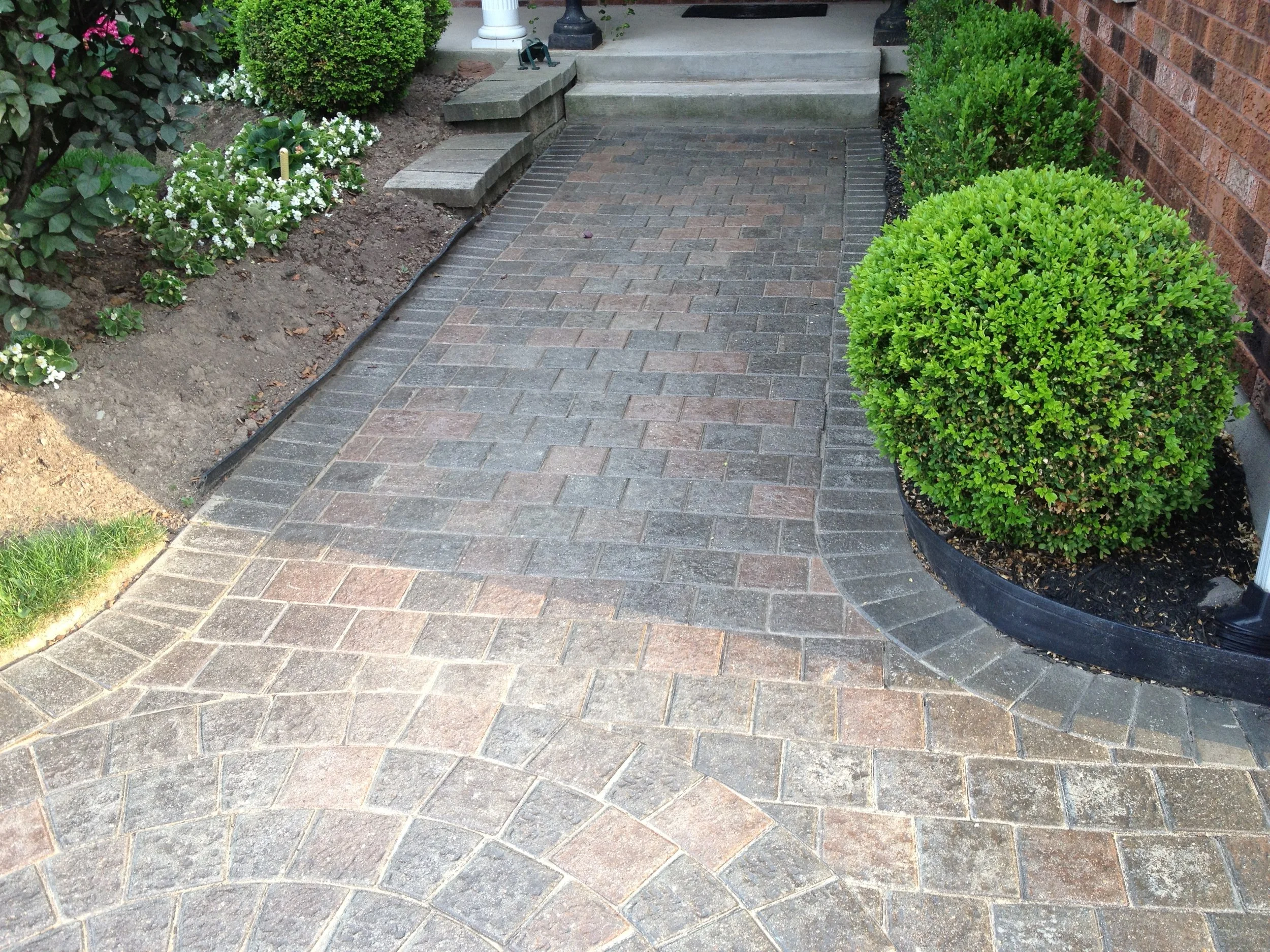 Interlock walkway after concrete sealing, Guelph