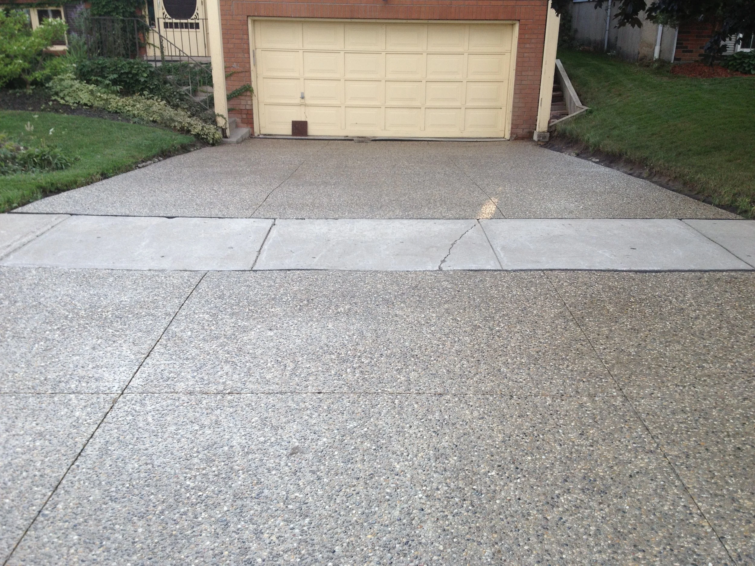 Concrete driveway and sidewalk after concrete sealing, Guelph