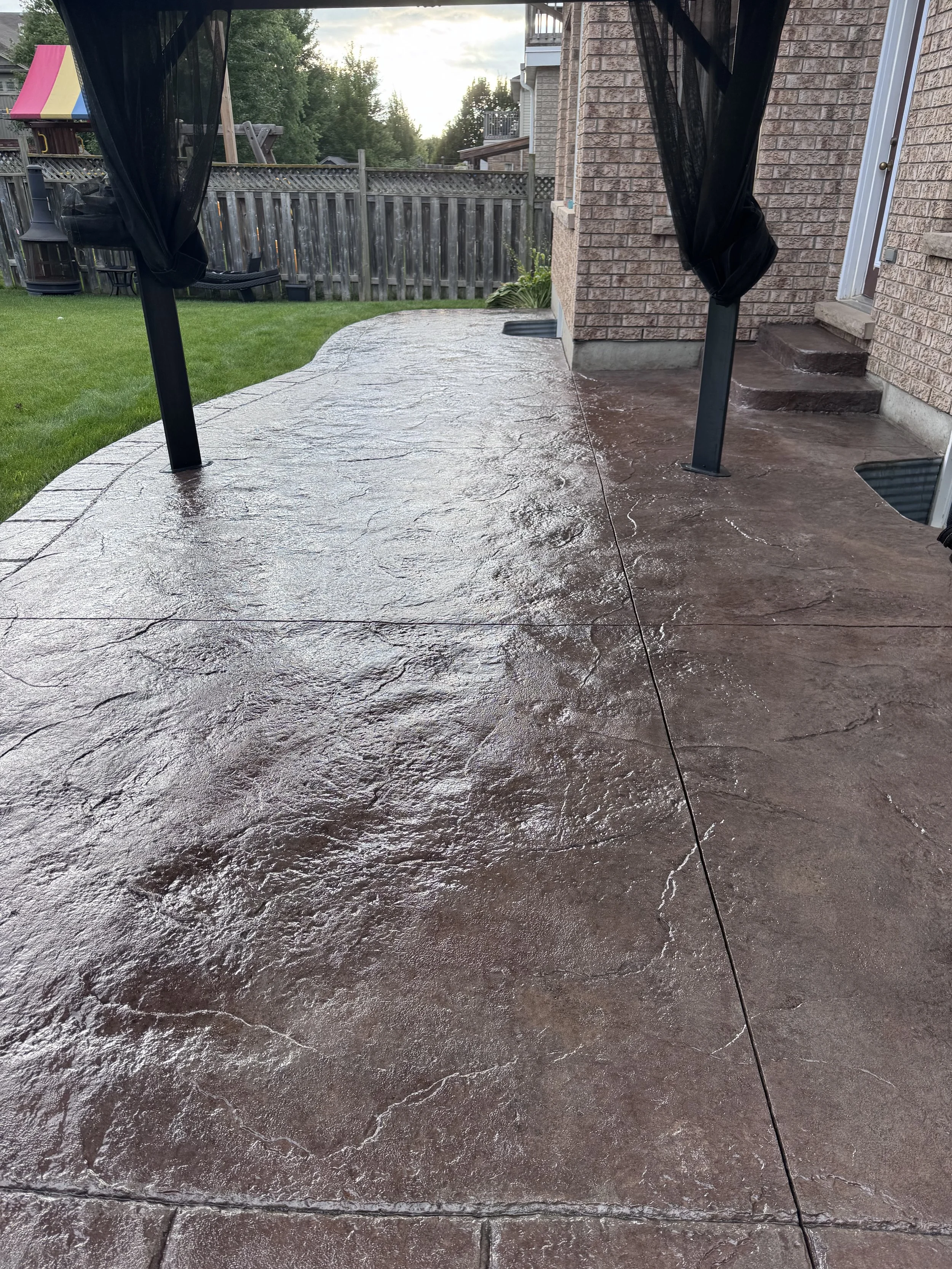 Stamped concrete patio after concrete sealing, wet finish, Cambridge