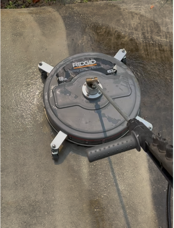 Pressure washing concrete driveway with rotary surface cleaner
