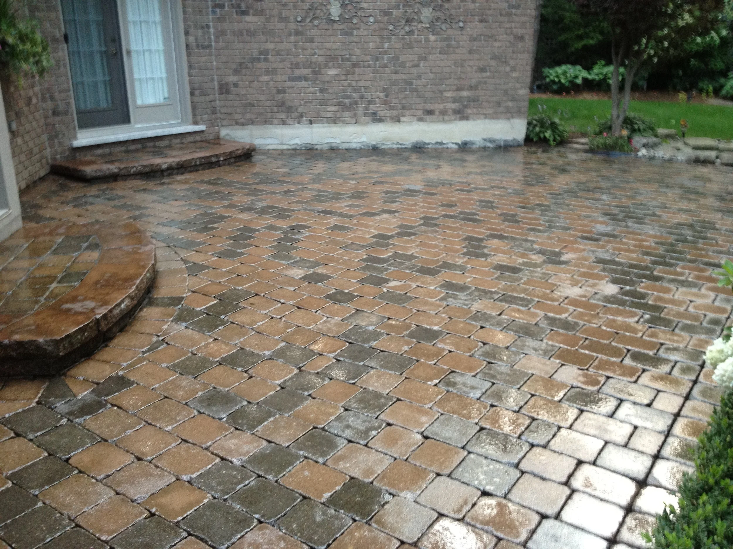 Brick patio after concrete sealing, wet finish, Guelph