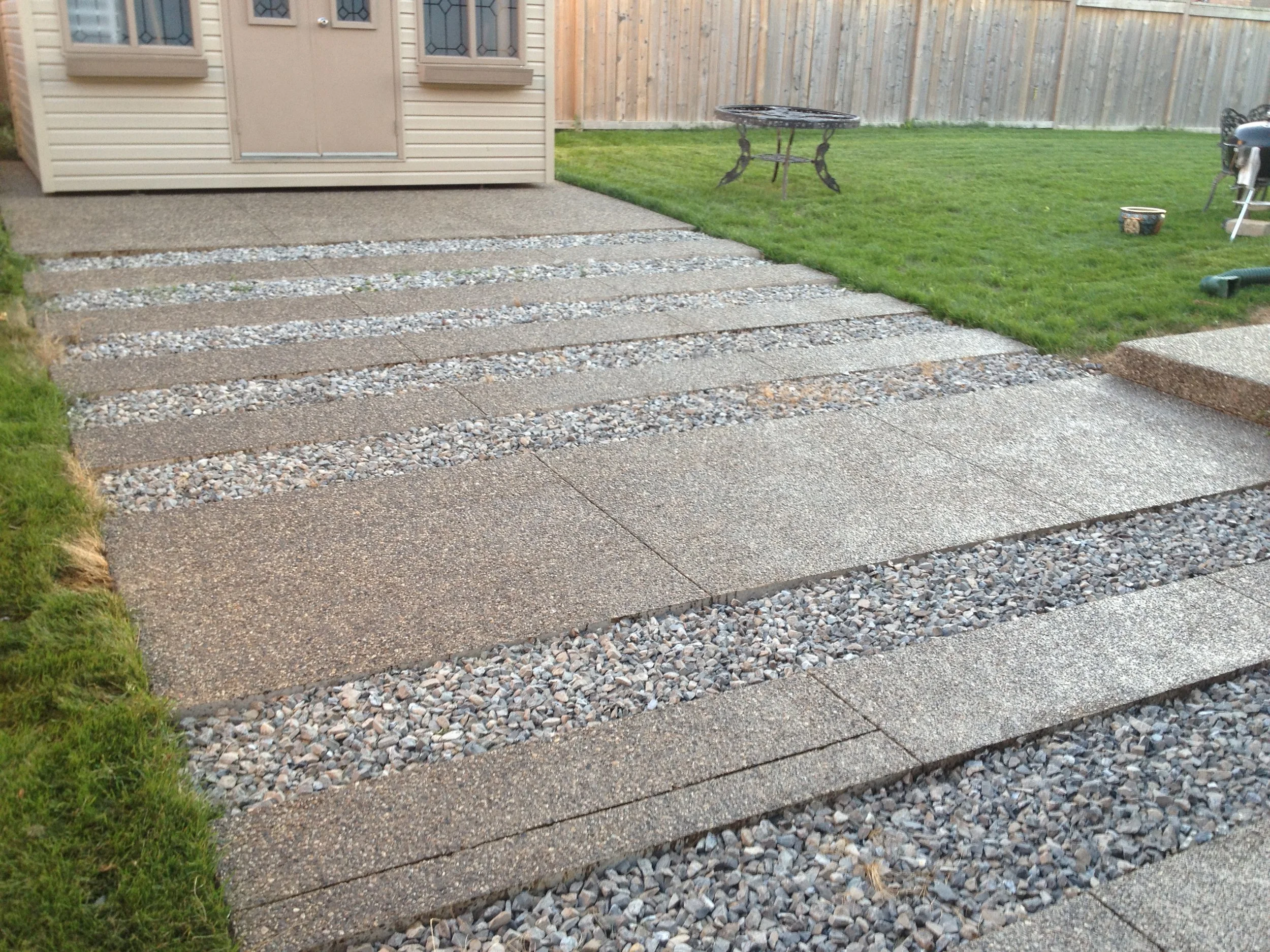Concrete and aggregate walkway after concrete sealing, Cambridge