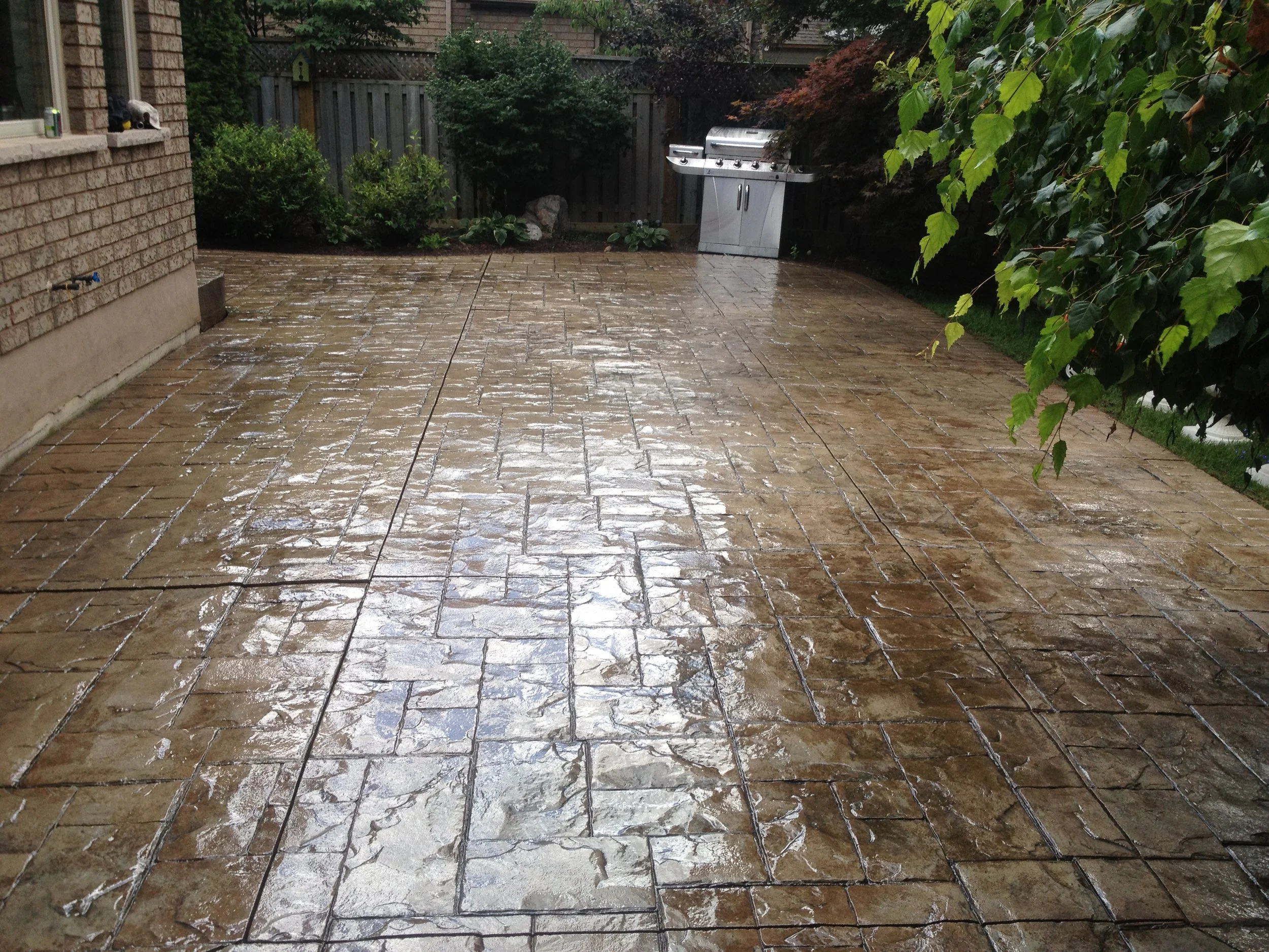 Stamped concrete patio after concrete sealing, wet finish, Kitchener
