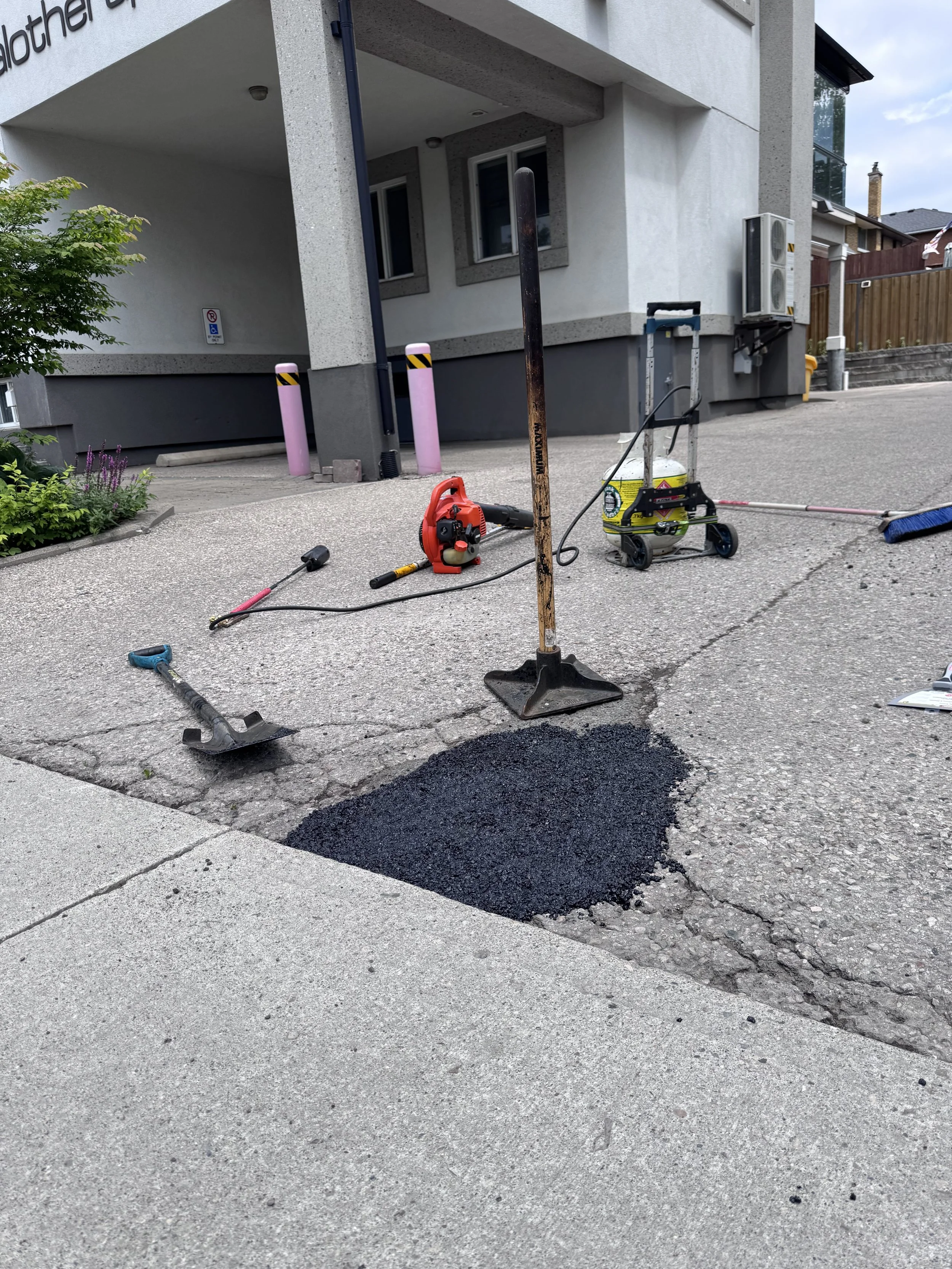 An image of work in progress for asphalt pothole repair