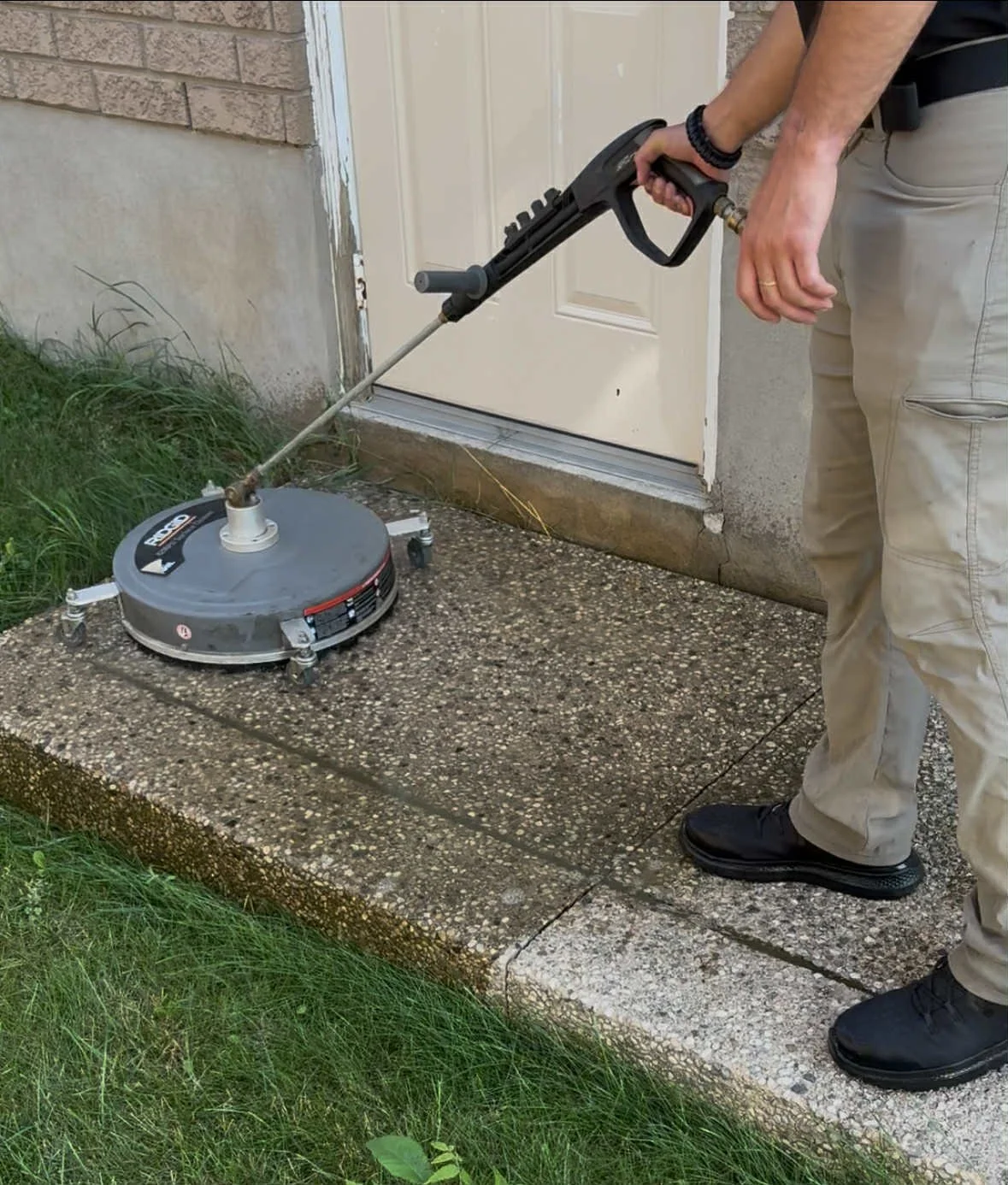 Pressure washing a concrete porch to prepare for concrete sealing, Kitchener