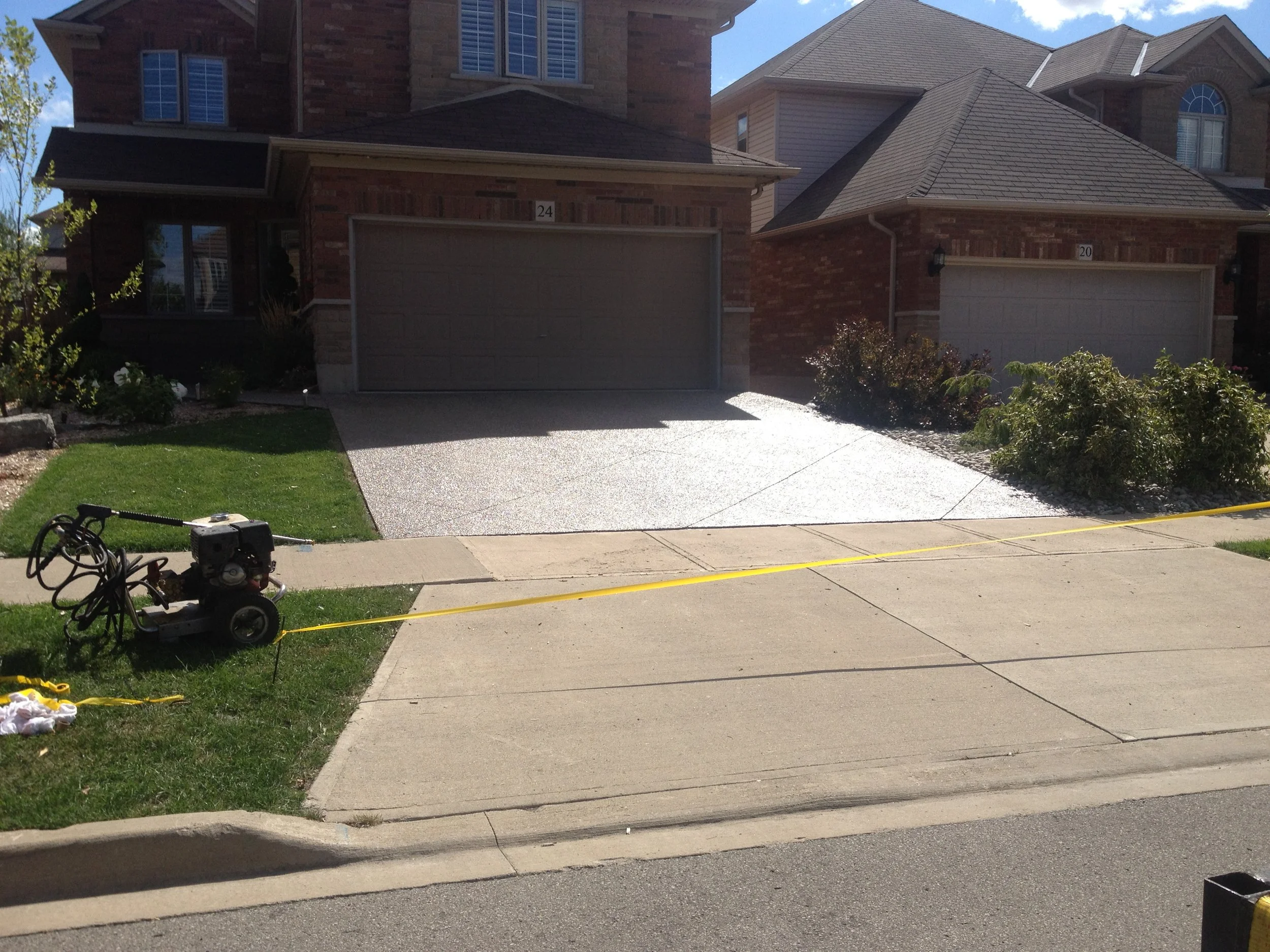 Concrete driveway prepped with pressure washing before concrete sealing, Guelph