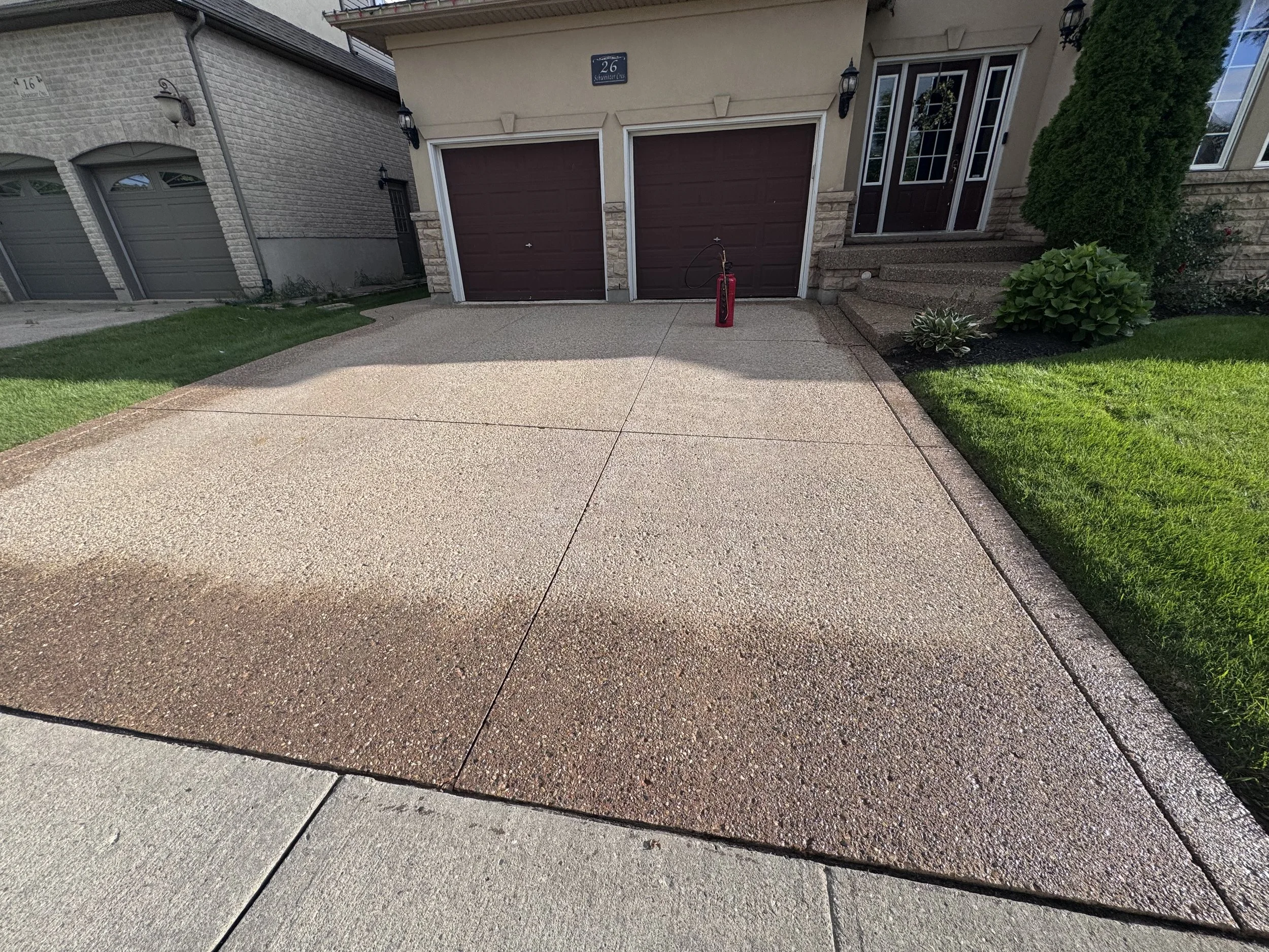 Textured concrete driveway before concrete sealing, Cambridge