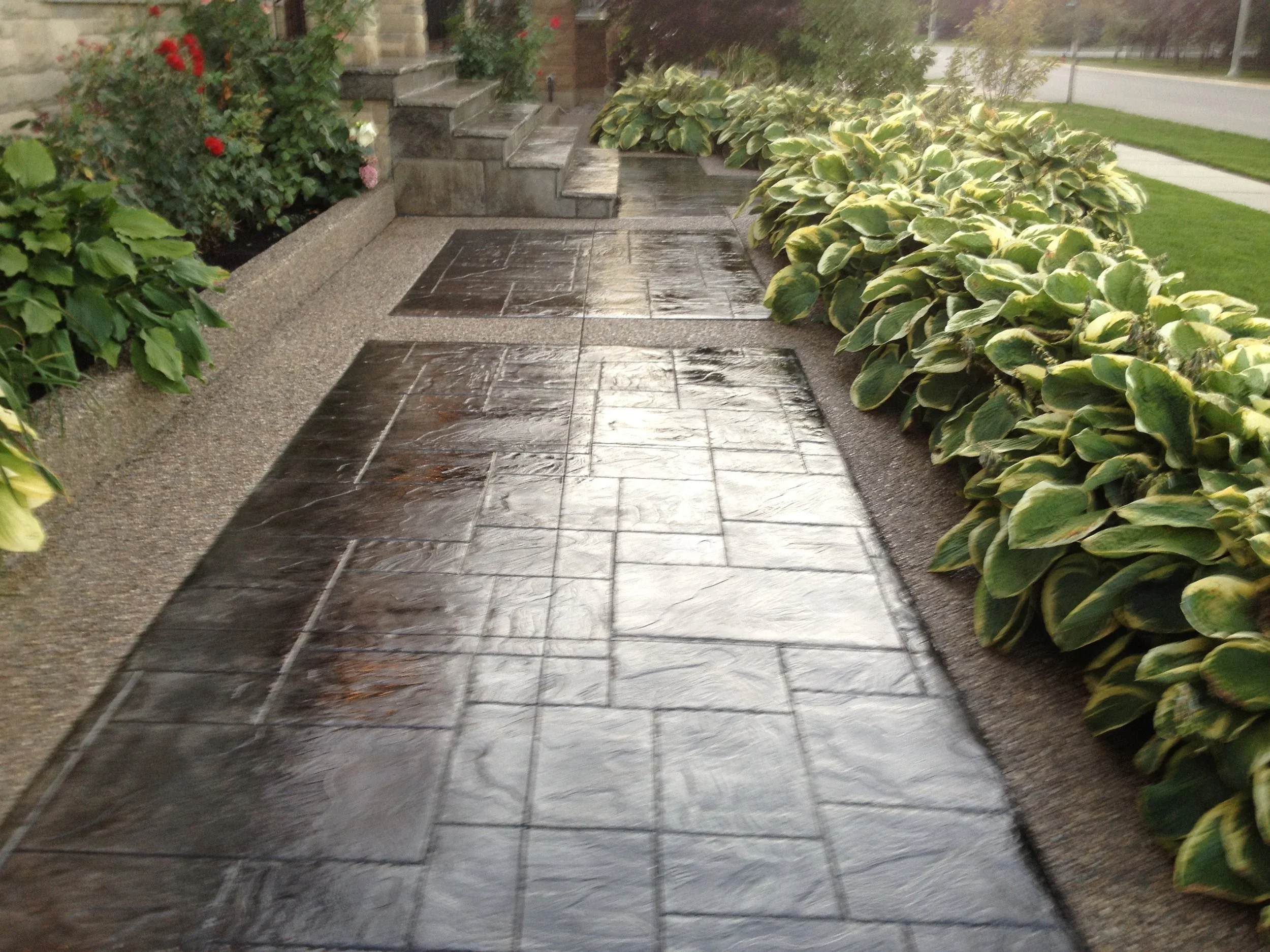 Interlock sidewalk after concrete sealing, wet sealed finish, Kitchener